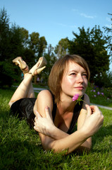 Beautiful girl in the summer park