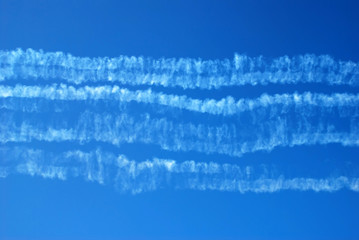 Smoke traces in blue sky