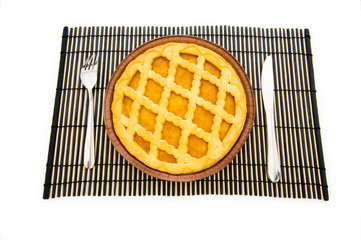 Sweet pie isolated on the green background