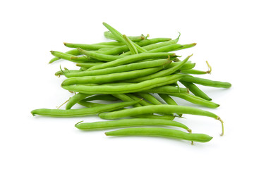 raw green beans over white background