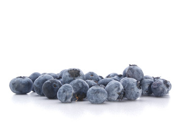 some sweet organic blueberries and a white background