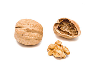 Cracked walnuts isolated on white background