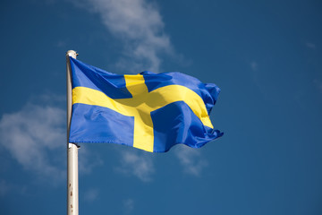 Swedish flag against blue sky