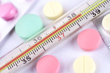 thermometer and pills