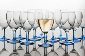 Glasses, one Full of Wine