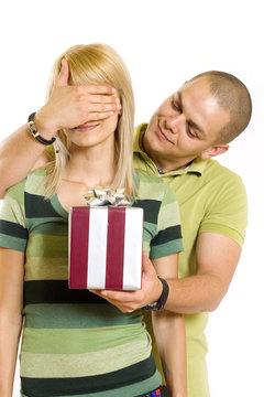 young man giving a present to his girlfriend..