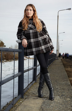 Girl near winter river