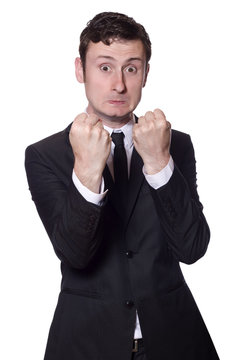 businessman showing boxing gesture