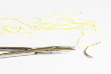 Instrument, needle and thread