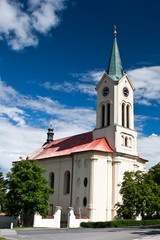 Fototapeta na wymiar Historic church in Mnisek pod Brdy