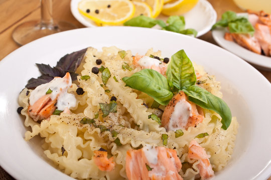 one serving of pasta mafalde with salmon