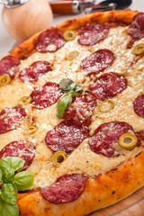 salami and green olives pizza