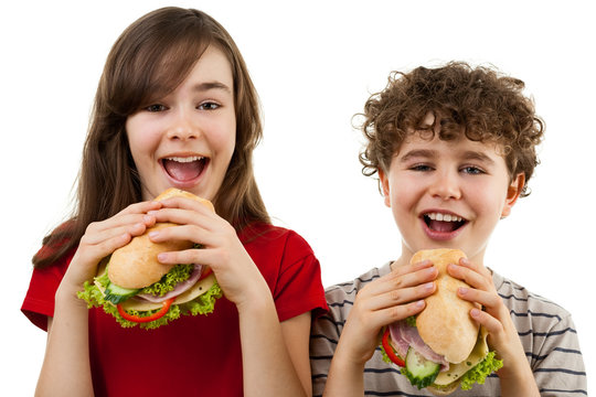 Kids Eating Healthy Sandwiches Isolated On White