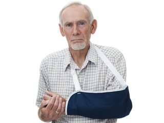 Senior man ith painful arm in sling