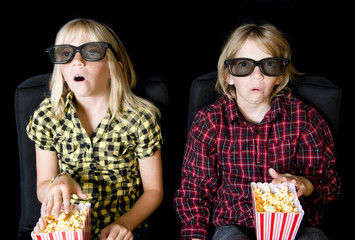 Fototapeta premium Two Kids at a Scary 3-D Movie
