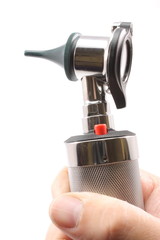 Otoscope held in a hand