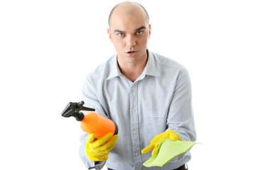 Businessman holding a cleaning accessories