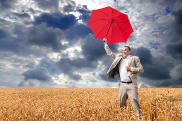 businessman with red umbrella