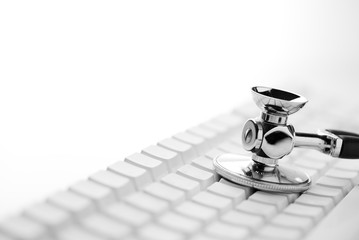 Keyboard and stethoscope in B + W