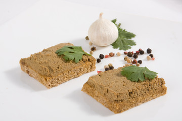 Toasts with pate against garlic and spices