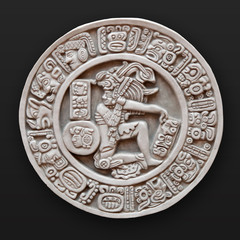 Stone bas-relief human round latin america