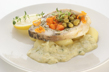 grilled carp fillet on organic potato with vegetable