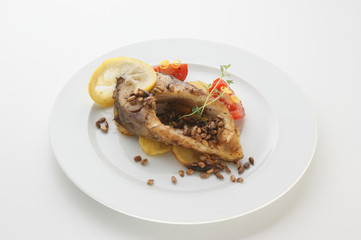 grilled carp fillet on organic potato with vegetable