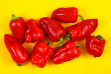 peppers on yellow backgownd