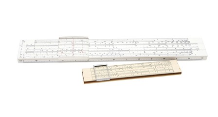 Two vintage slide rule mechanical calculators isolated