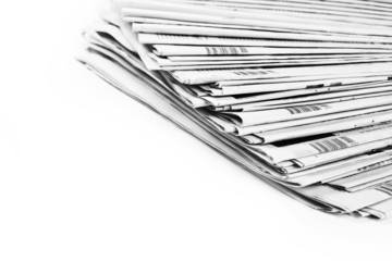 Stack of isolated newspapers in black and white