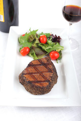 Steak dinner - juicy grilled pepper steak