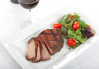 Steak dinner - juicy grilled pepper steak