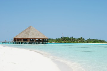 Bungalow's architecture and beach on a Maldivian Island