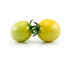 Two Ripe Yellow Tomatoes Isolated on White