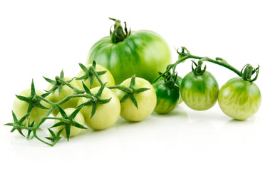 Bunch of Ripe Yellow and Green Tomatoes with Green Leaf Isolated