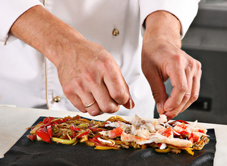Chef preparing pasta roll