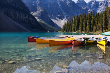 Canoes on Moraine Lake - obrazy, fototapety, plakaty