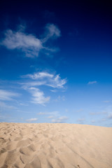 Fototapeta na wymiar sand with blue sky