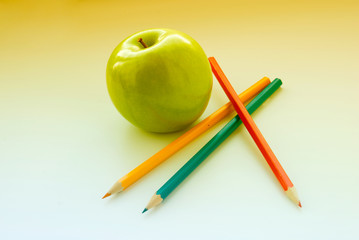 Naklejka premium apple and pencils