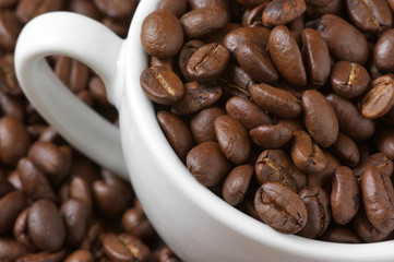 Coffee beans and cup