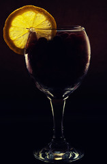 glass with a slice of lemon