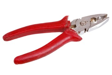 Old pliers with red handles, isolated on white background