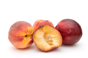 Group of peaches and plums.