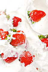 strawberries falling in cream - 16716159