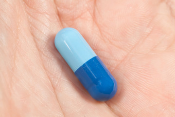 Capsule in a hand