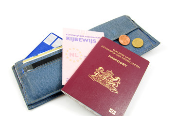 Wallet and Dutch documents over white background