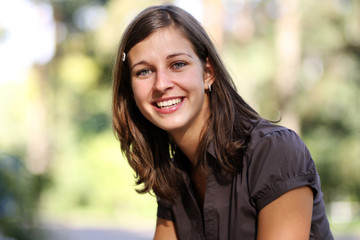 Fototapeta premium Closeup portrait of a happy young woman