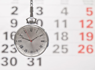 Closeup clock and calendar