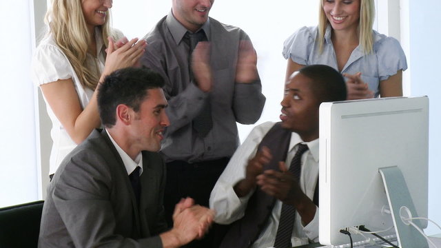 Business people applauding in the office
