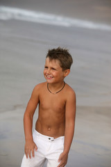 Happy boy on the beach